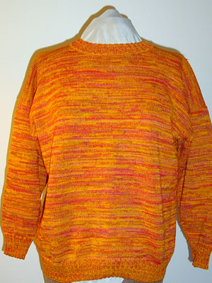 Pullover aus gefachten Garnen in Orangetönen